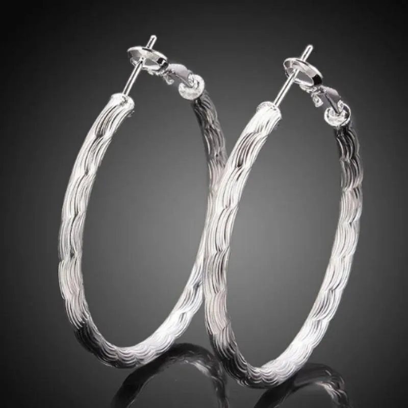 Diamond Cut Hoop Earrings In White Gold