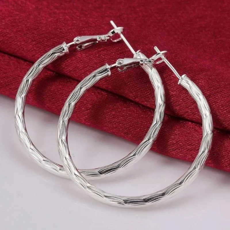 Diamond Cut Hoop Earrings In White Gold